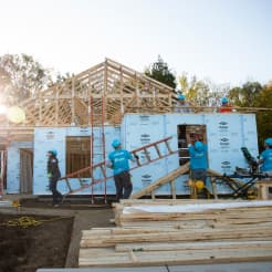 Volunteers building a home