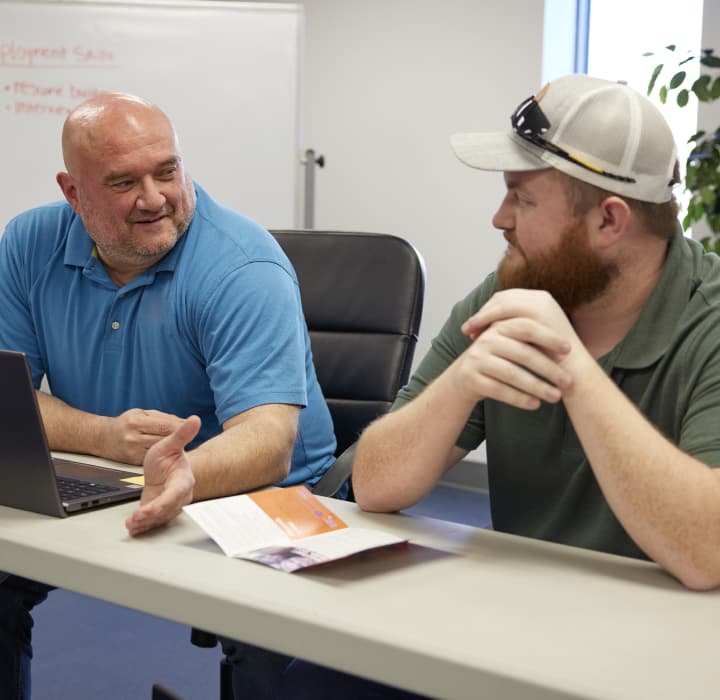 People at a classroom doing a Habitat for Humanity program